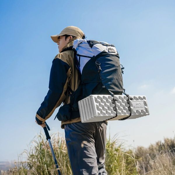 Килимок туристичний складаний одномісний IXPE Naturehike CNK2650WS010 з алюмінієвою плівкою, 185x56x2.3 см, жовтий 6977465865731 фото